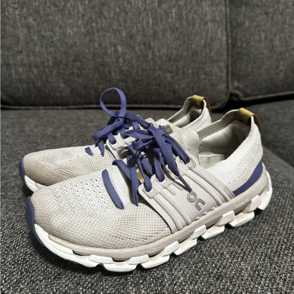 On Running Shoes with Purple Accents